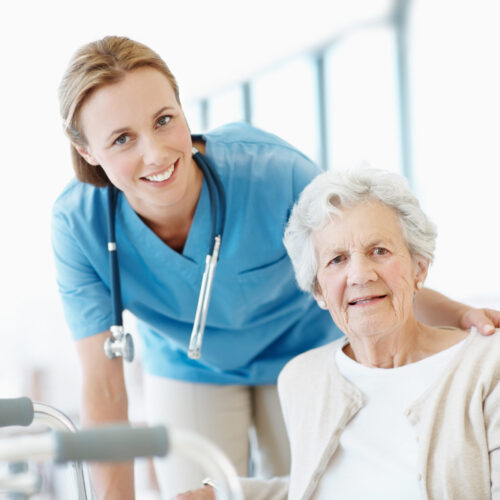 Caring and trustworthy rehabilitation Portrait of an elderly woman getting ready to use her walker with help from her nurse